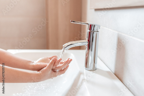 Child washing her hands thoroughly using the recommended washing techniques - part II