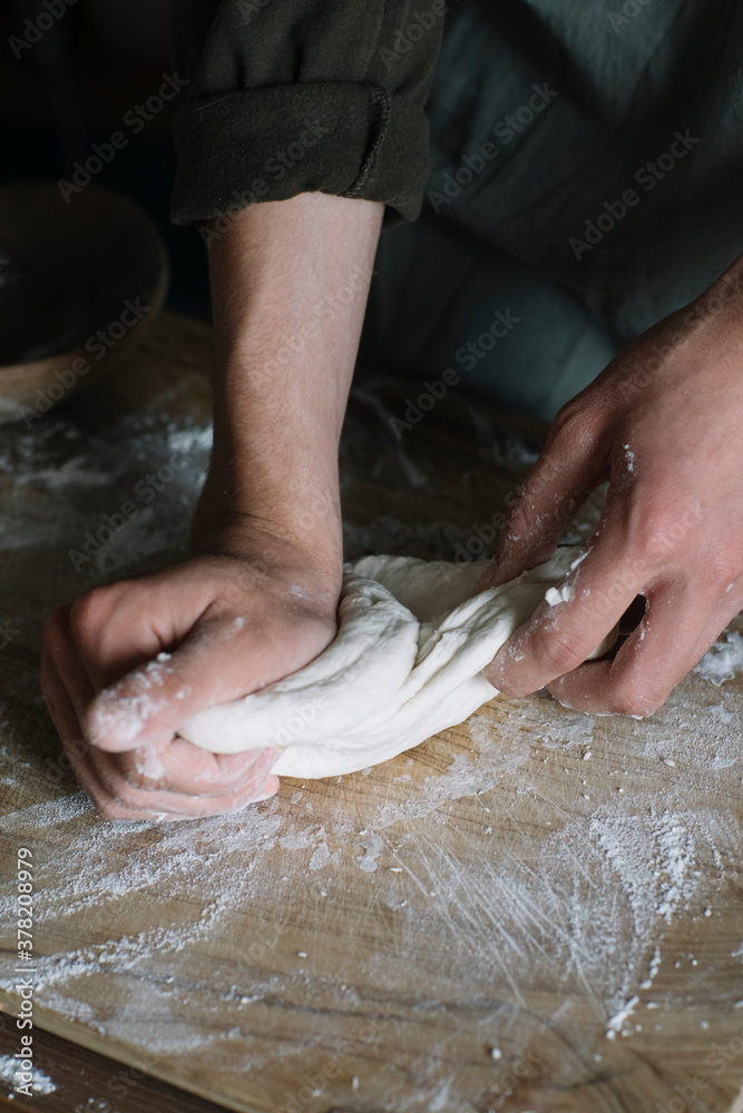 Closeup Of Man's Hands Making Homemade Asian Dumplings Closeup Of Man's Hands Making Homemade Asian Dumplings