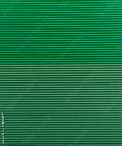 Textura de fachada metálica ondulada color verde