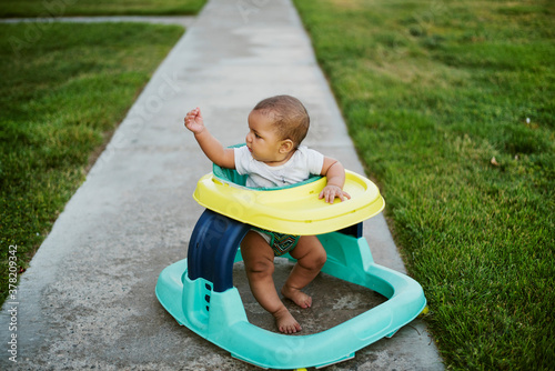 Baby in the walker photo