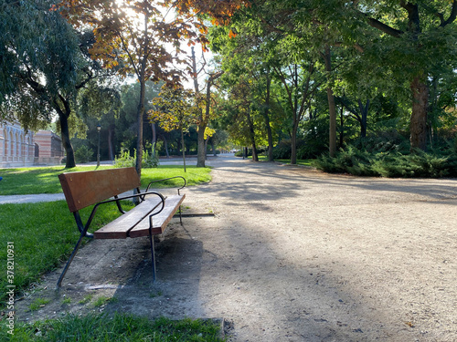 Lonely Bench in the Retiro Park next to the Palace. © Heisenberg