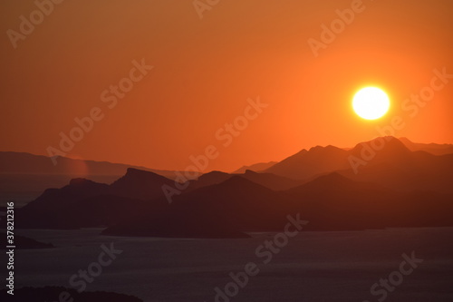 Beautiful sunset from the mountains with the sea in the background