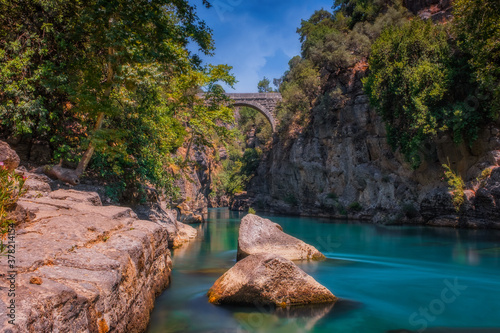 Koprulu Canyon. A view of Kopru River and Koprulu Canyon. National Park in the province of Antalya, south western Turkey. The canyon is crossed by the Roman Oluklu bridge. July 2020,long exposure shot photo