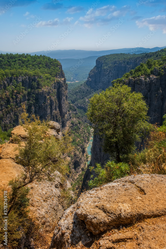 The canyon between the two mountains, which are shaped as horns, which the people of the region call the 'Tazi Canyon', reveals the view of Köprüçay under the feet. August 2020 The canyon between the two mountains, which are shaped as horns, which the people of the region call the 'Tazi Canyon', reveals the view of Köprüçay under the feet. August 2020