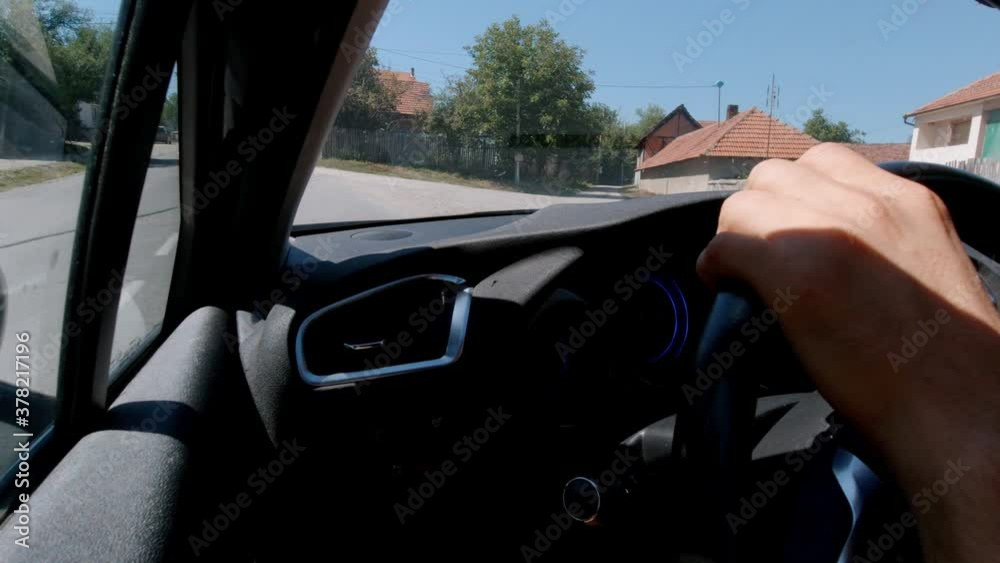 Driving modern car through the settlement 4K video Driving modern car through the settlement 4K video
