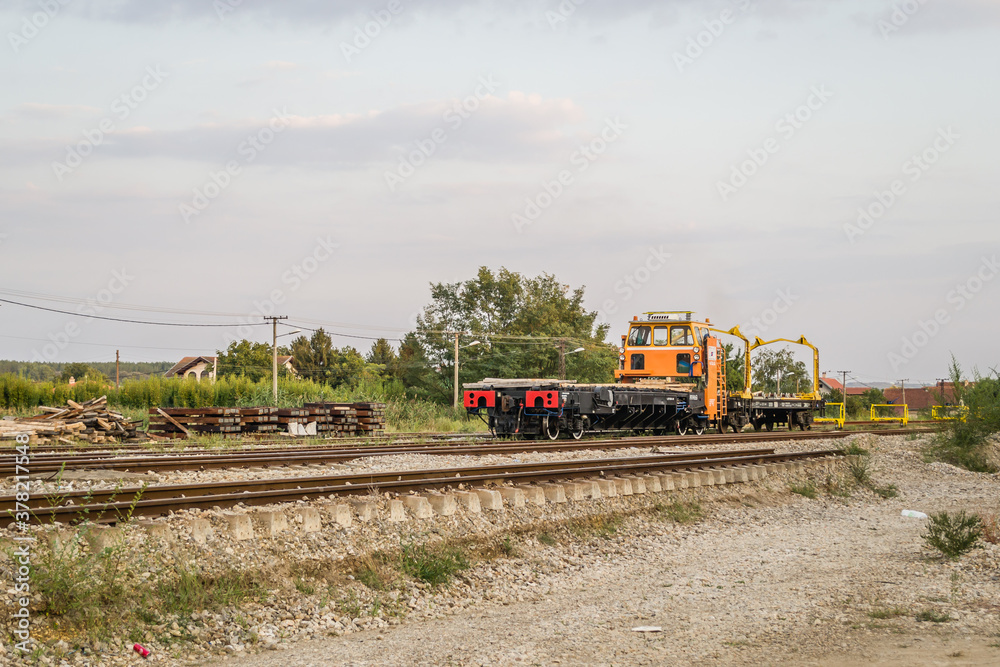Obraz premium Working machines for laying the railway in Petrovaradin near the city of Novi Sad, Serbia 