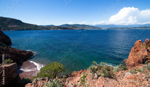 Blue mediterranean sea and red cliff during spring in Mandelieu, France © jlf46