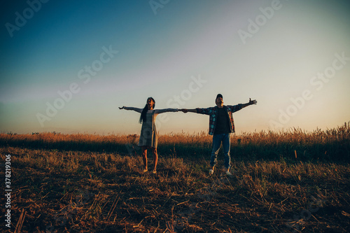 Love couple. Couple in love. Sunset. Man and woman nature. Lovely. 