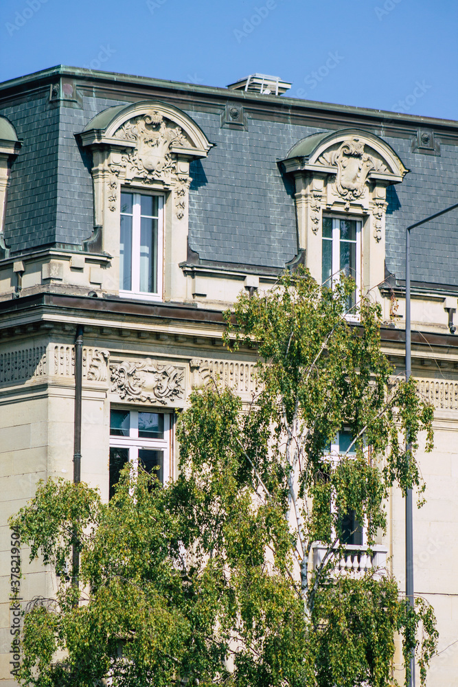 View of the facade of a historical building located in Reims, a city in the Grand Est region of France and one of the oldest in Europe