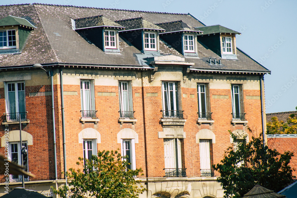 Fototapeta premium View of the facade of a historical building located in Reims, a city in the Grand Est region of France and one of the oldest in Europe