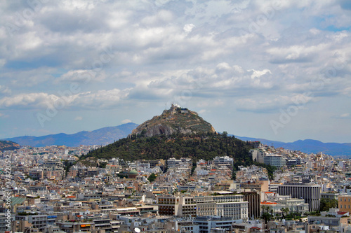 Athens aerial view over the city districts and Lykavitos hill,  Greece photo