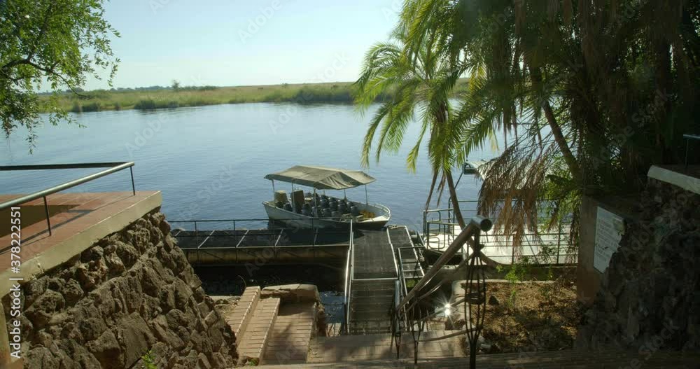 Pan right, boat docked in Botswana Pan right, boat docked in Botswana