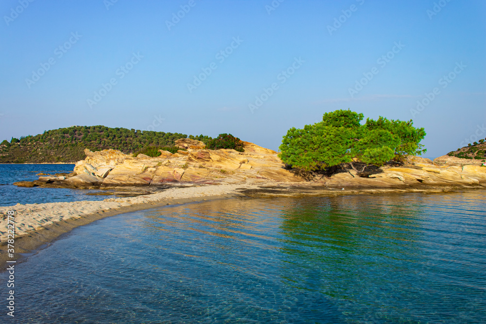 beautiful nature landscape summer photography of rocky island and lonely tree sea bay wilderness scenic view Greece Mediterranean region