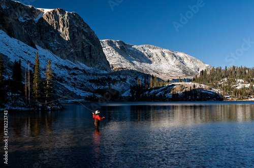 Sam fly fishing in Lake Marie; Snowy Range; nr Laramie, WY