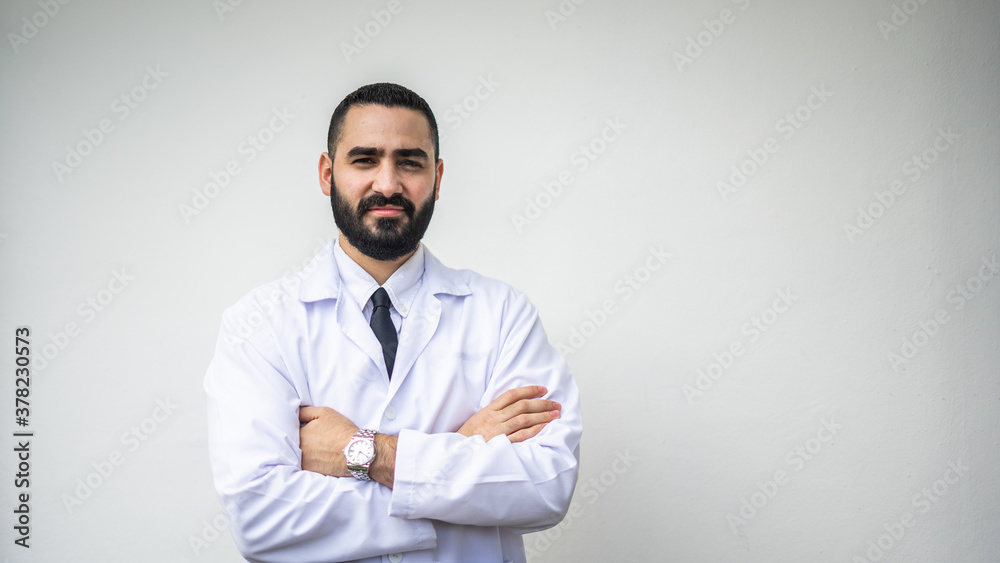 Handsome doctor thinking at the hospital