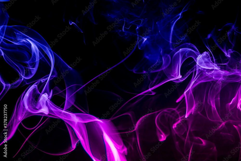 Obraz premium Colored smoke on black background