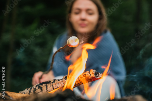 Roasting marshmallows over a campfire