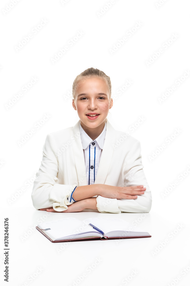 Portrait of Smiling Caucasian Teenager Girl Posing with Book. Isolated On White. Portrait of Smiling Caucasian Teenager Girl Posing with Book. Isolated On White.