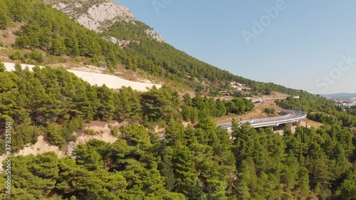 Aerial view over coastal road called Jadranska magistrala near Omis, Croatia photo