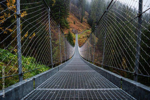 Suspended metal bridge.