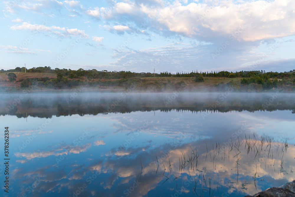 beautiful calm lake at sunrise
beautiful calm lake at sunrise