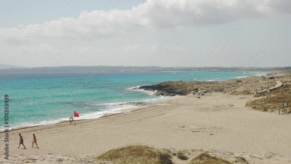 4k Slow-motion, Formentera beach in Spain coast the Mediterranean Sea. Amazing water color blue 4k Slow-motion, Formentera beach in Spain coast the Mediterranean Sea. Amazing water color blue