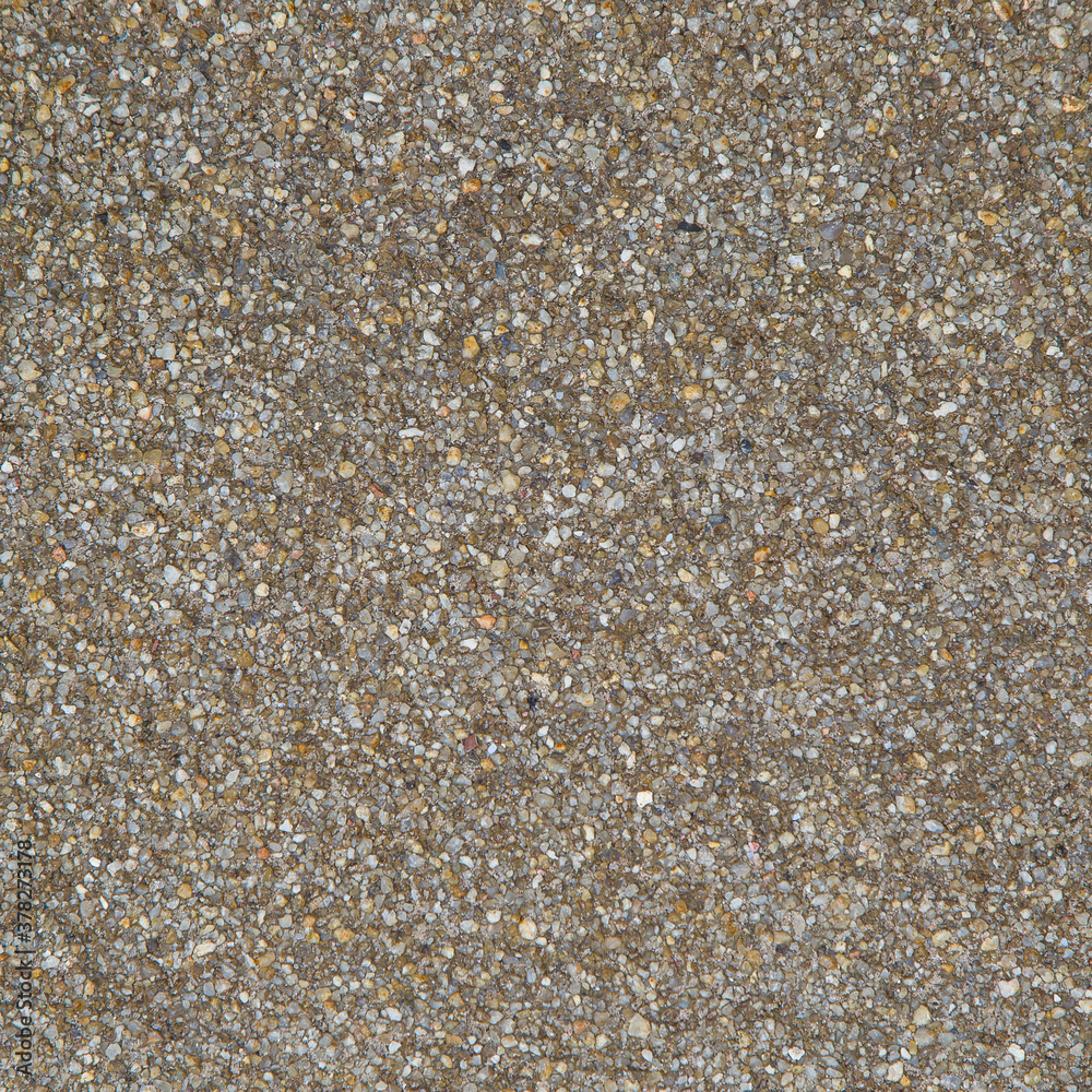 Pebble stones in a road for background. Square picture Pebble stones in a road for background. Square picture