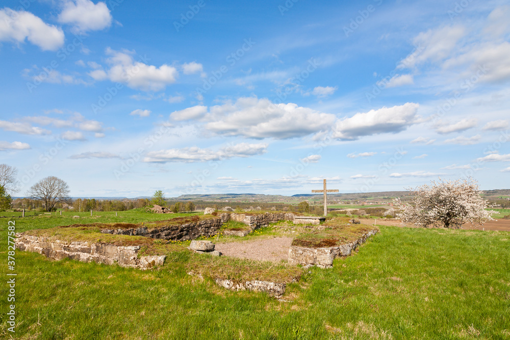 Scenic view at an old church ruin on a meadow at spring
