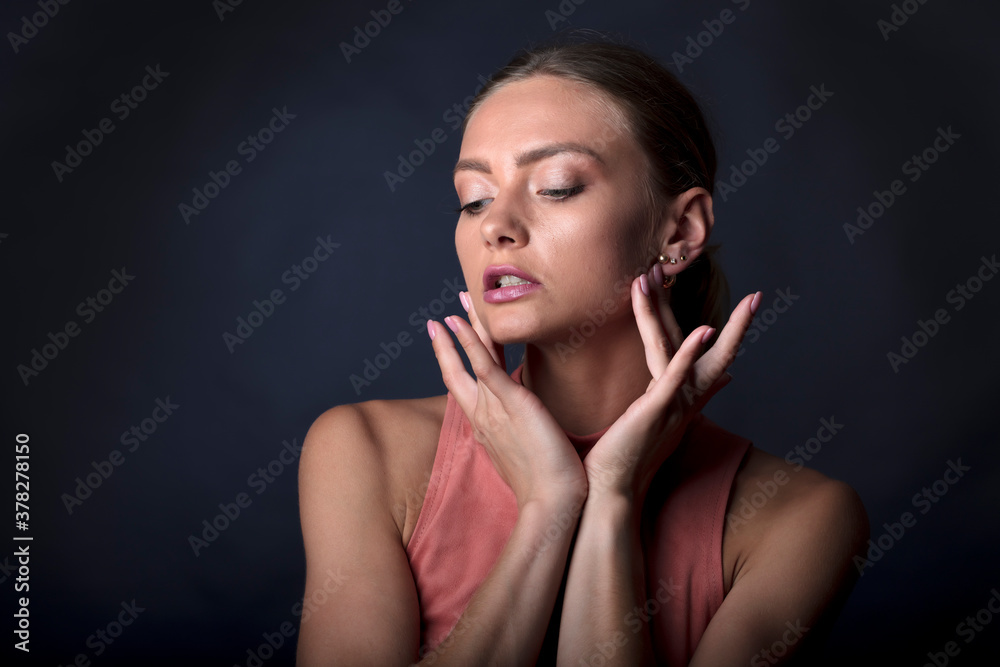 studio portrait of a young woman studio portrait of a young woman