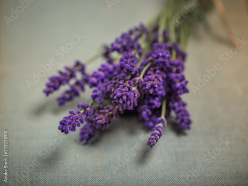 Fresh flowers of lavender bouquet on rustic wooden background