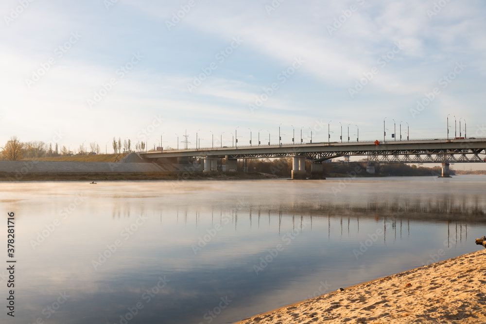 Railway bridge over the river Sozh in the sunset sunlight. Gomel. Belarus.