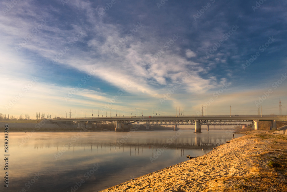 Railway bridge over the river Sozh in the sunset sunlight. Gomel. Belarus.