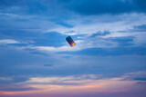 Floating lanterns in the evening sky.