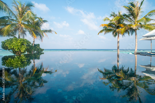 Infinity Swimming Pool in the Best Romantic Tropical Resort -