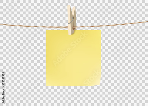 Yellow paper sticky note hanging on a rope