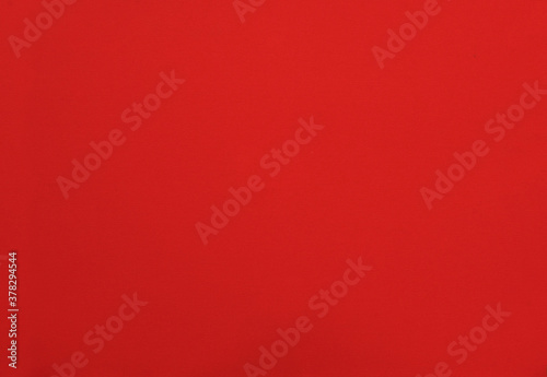 Red color paper background,cardboard texture.