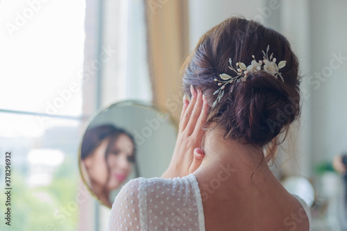 Close-up of a beautyful wedding hairstyle with hair decoration