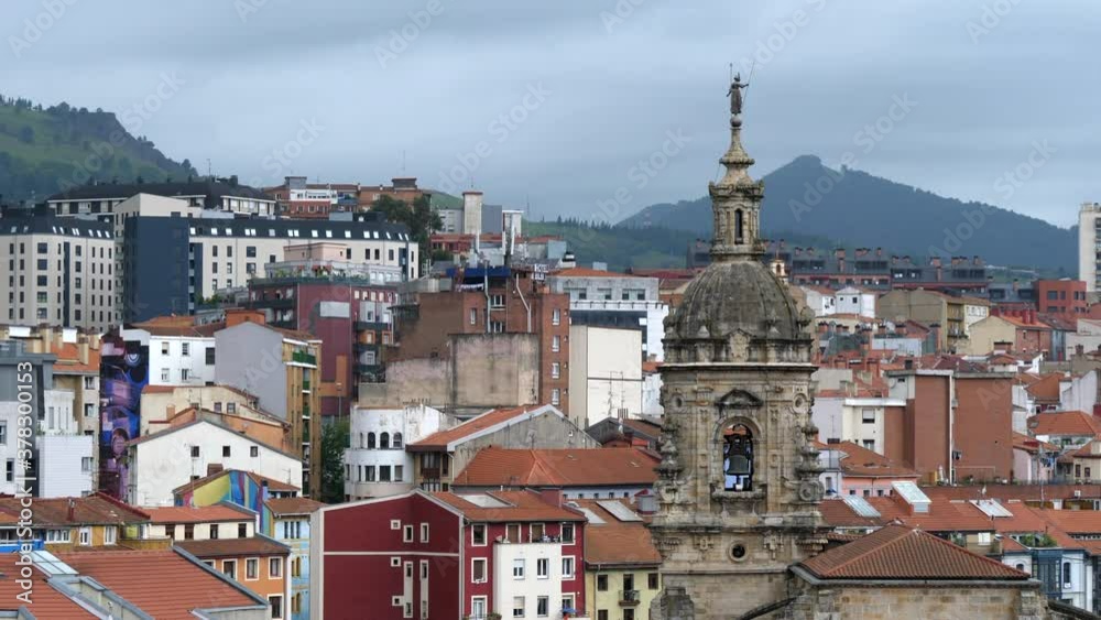 Belfry Tower Of The Church Of San Anton In Old Town Neighbourhood Of Bilbao, Basque Country, Spain. - wide static shot Belfry Tower Of The Church Of San Anton In Old Town Neighbourhood Of Bilbao, Basque Country, Spain. - wide static shot