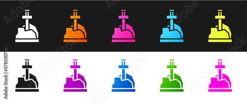 Set Sword in the stone icon isolated on black and white background. Excalibur the sword in the stone from the Arthurian legends. Vector.