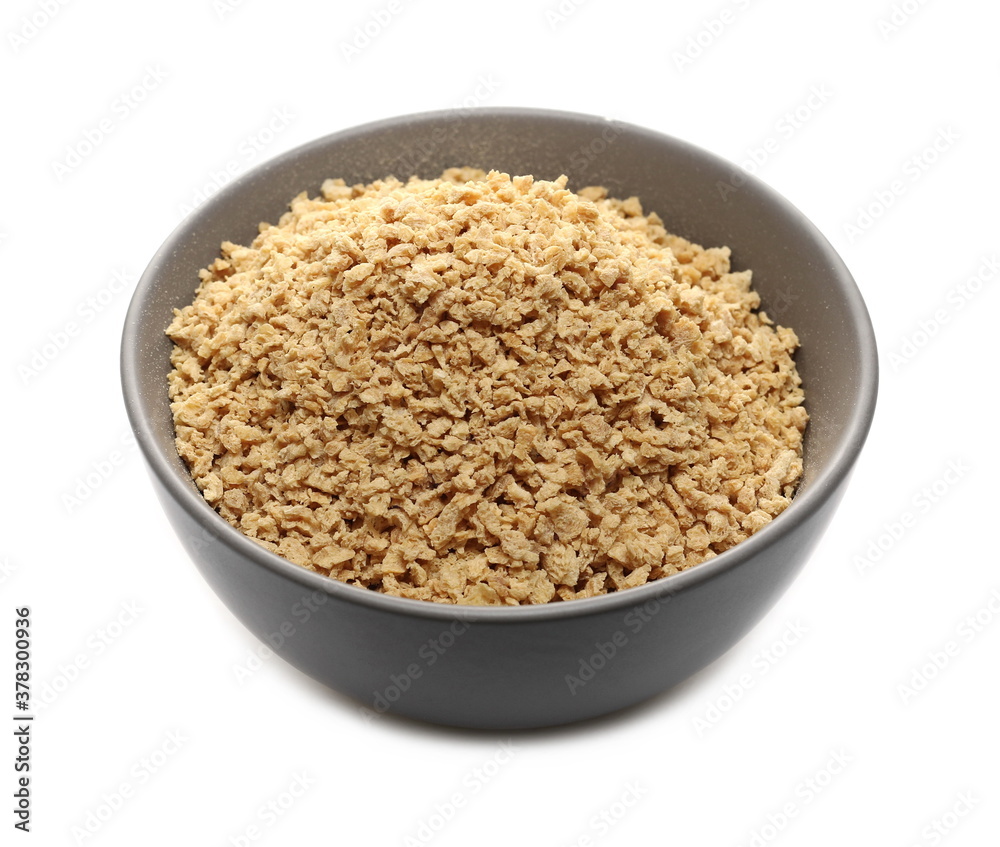 Soy flakes in ceramic bowl isolated on white background Soy flakes in ceramic bowl isolated on white background