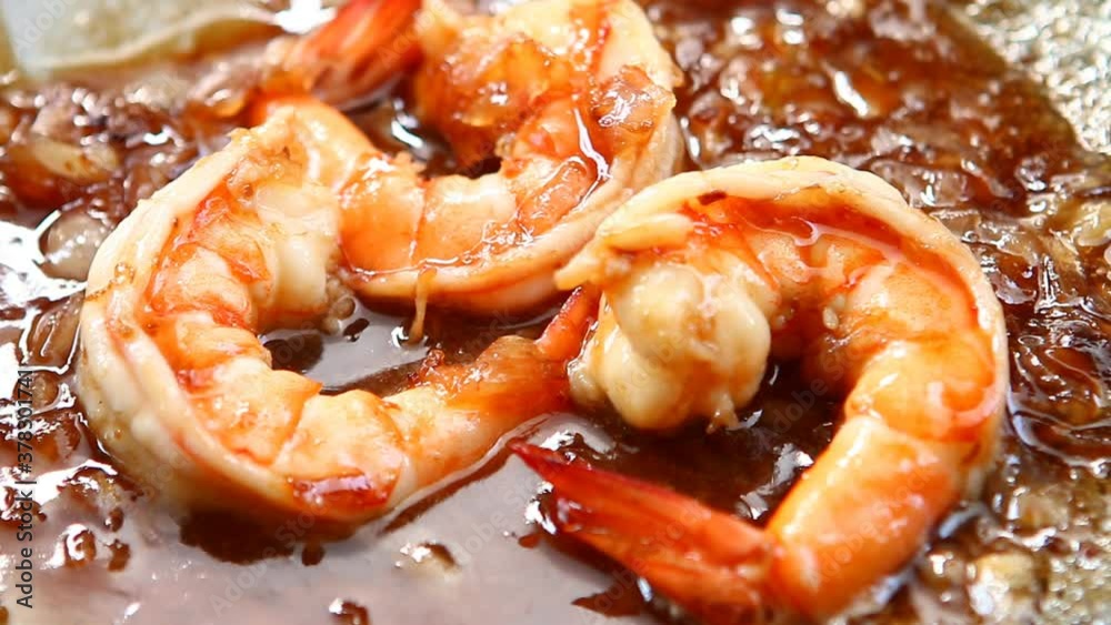 Frying prawns with tamarind sauce in pan , Thai famous food