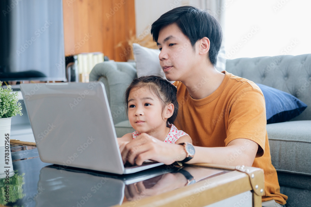Young man and school-girl working form home and e-learning.