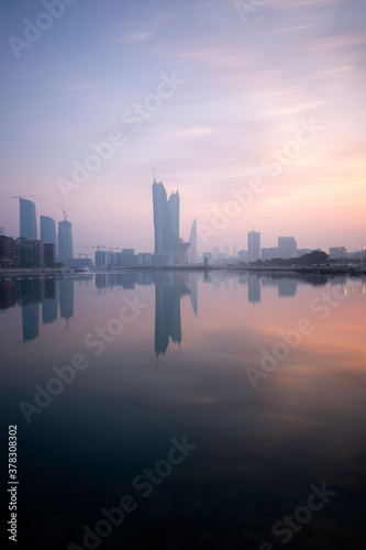 Bahrain skyline and beautiful hues during sunrise. This is a long exposure image.