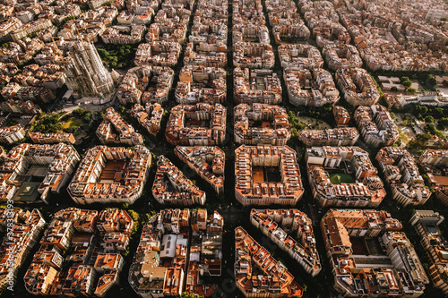 Aerial view of the residential Eixample district of Barcelona, with the Sagrada Familia, Designed by Catalan architect Antoni Gaudi