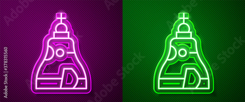 Glowing neon line The Tsar bell in Moscow monument icon isolated on purple and green background. Vector.
