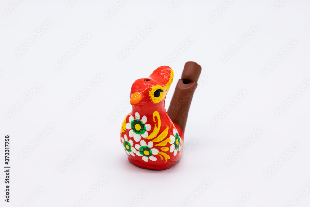 Water ceramic  whistle red  nightingale bird isolated on white. Russian traditional kids toy musical wind instrument, horn.