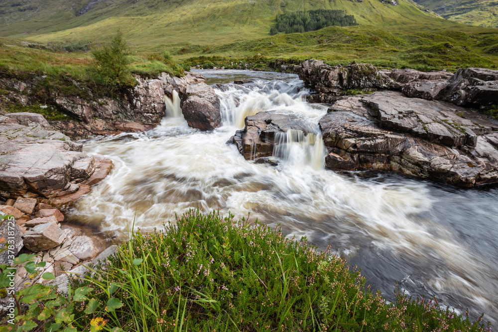 long exposure image of the waterfalls in glen etive in the argyll region of the highlands of scotland during autumn after heavy rainfall long exposure image of the waterfalls in glen etive in the argyll region of the highlands of scotland during autumn after heavy rainfall