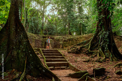 Tourist at archaeological site of Palenque, Mexico photo
