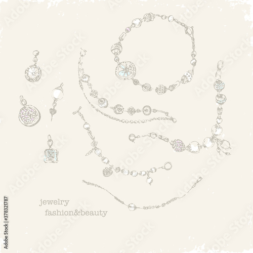 Hand drawn silver jewelry with gems and pearls