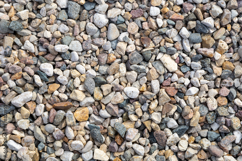 Top view of textured yellow and white pebble stones ground Top view of textured yellow and white pebble stones ground